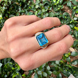 Emerald Cut Blue Topaz Ring with Side Diamonds