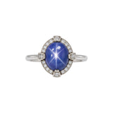 Platinum Oval Star Sapphire Ring with Diamond Halo